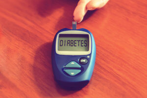 Diabetes Concept With Diabetes Medication On Wooden Desk