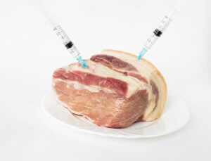 pork meat in it syringes with an hormone