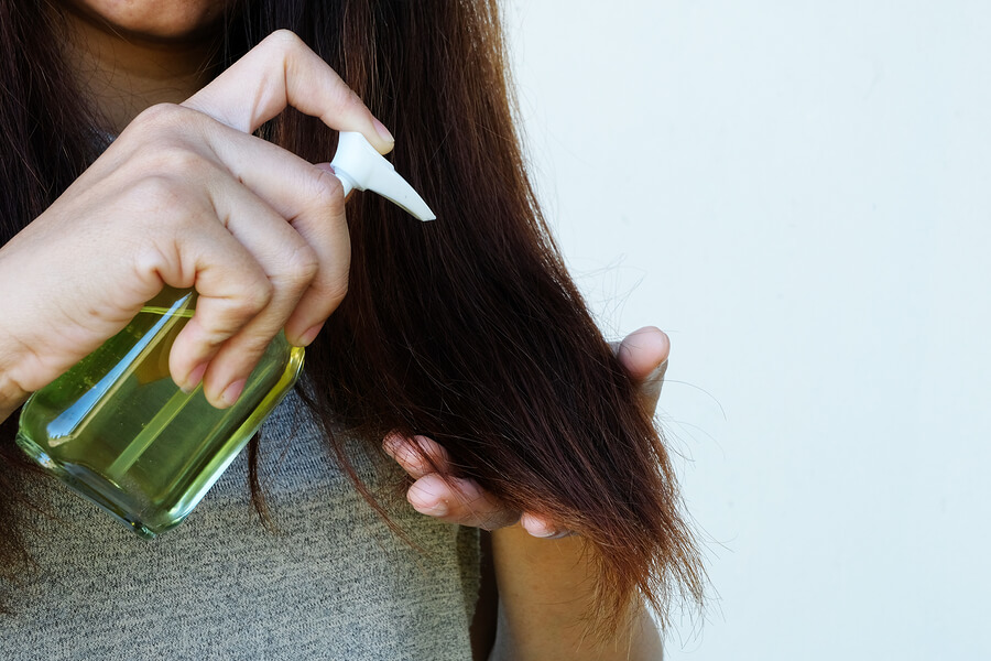 Female And Coconut Oil In Hand With Treatment Hair Damage, Hair